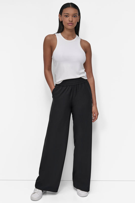 بنطال بقصة ساق عريضة وخصر مرتفع